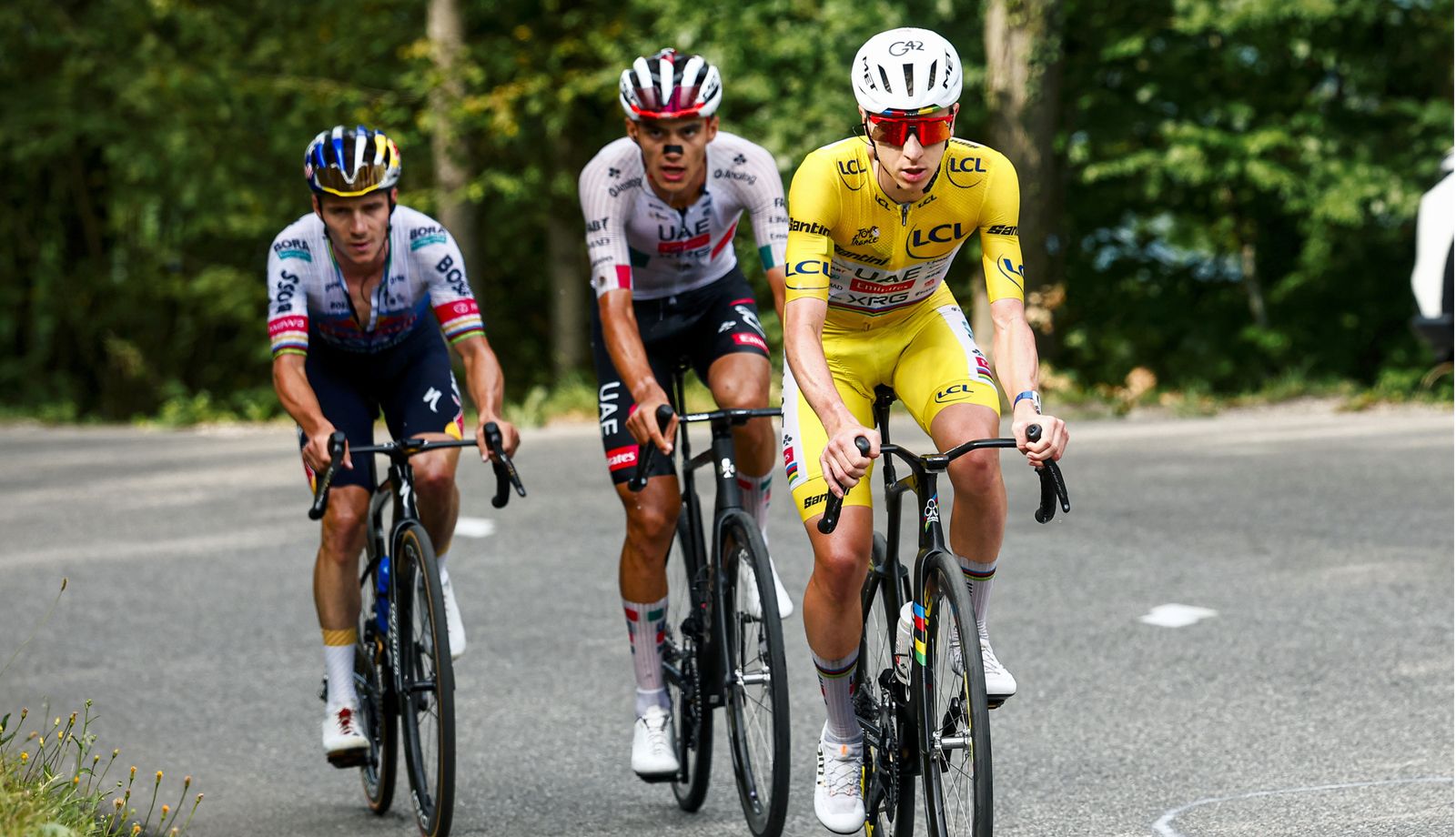 Pogacar, Del Toro y Evenepoel, los tres primeros de la general del Tour, en la subida a Plateau de Solaison en la 15ª etapa. Pogacar, Del Toro y Evenepoel, los tres primeros de la general del Tour, en la subida a Plateau de Solaison en la 15ª etapa.