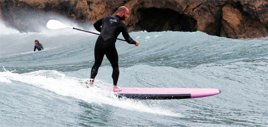 Paddle surf