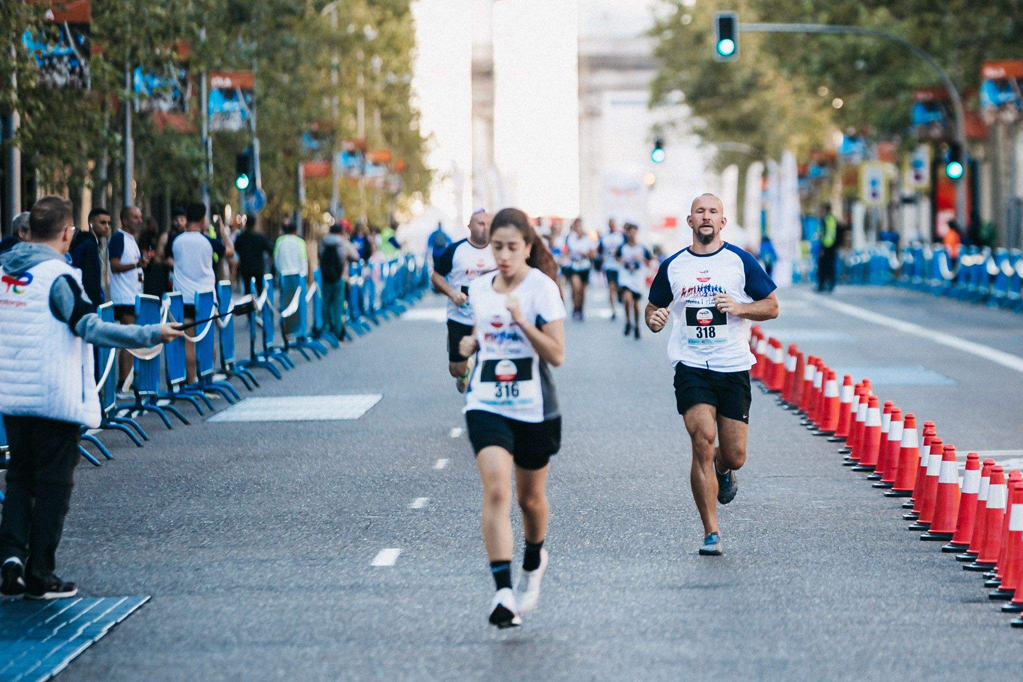 Las mejores fotos de las carreras populares en la TotalEnergies Milla Internacional de Madrid 2023. (41)