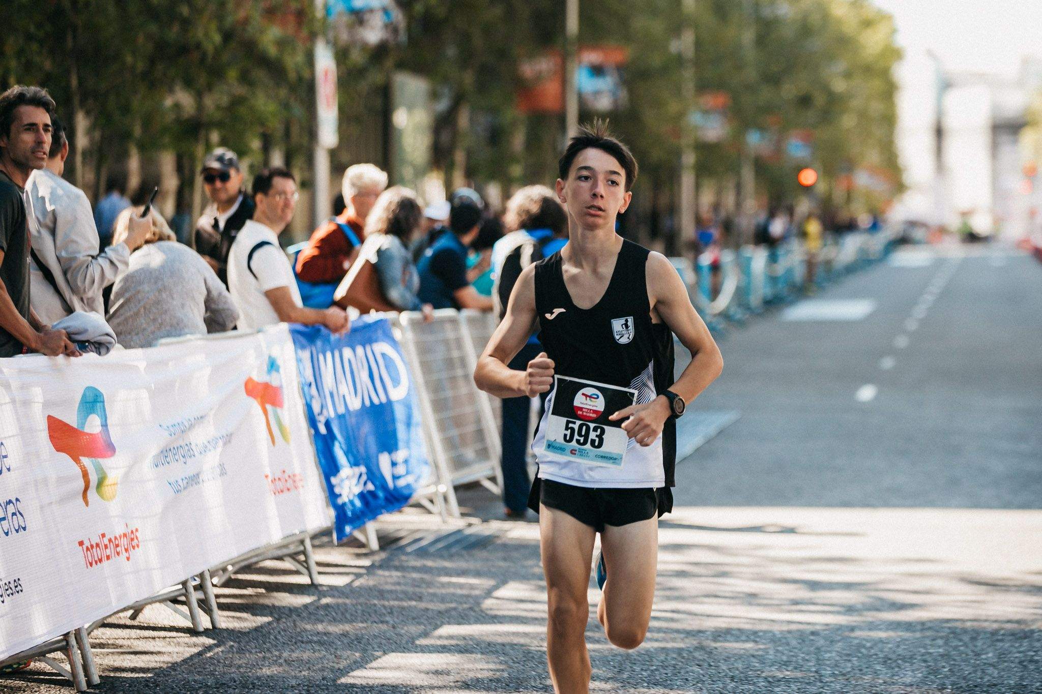 Las mejores fotos de las carreras populares en la TotalEnergies Milla de Madrid 2023. (147)