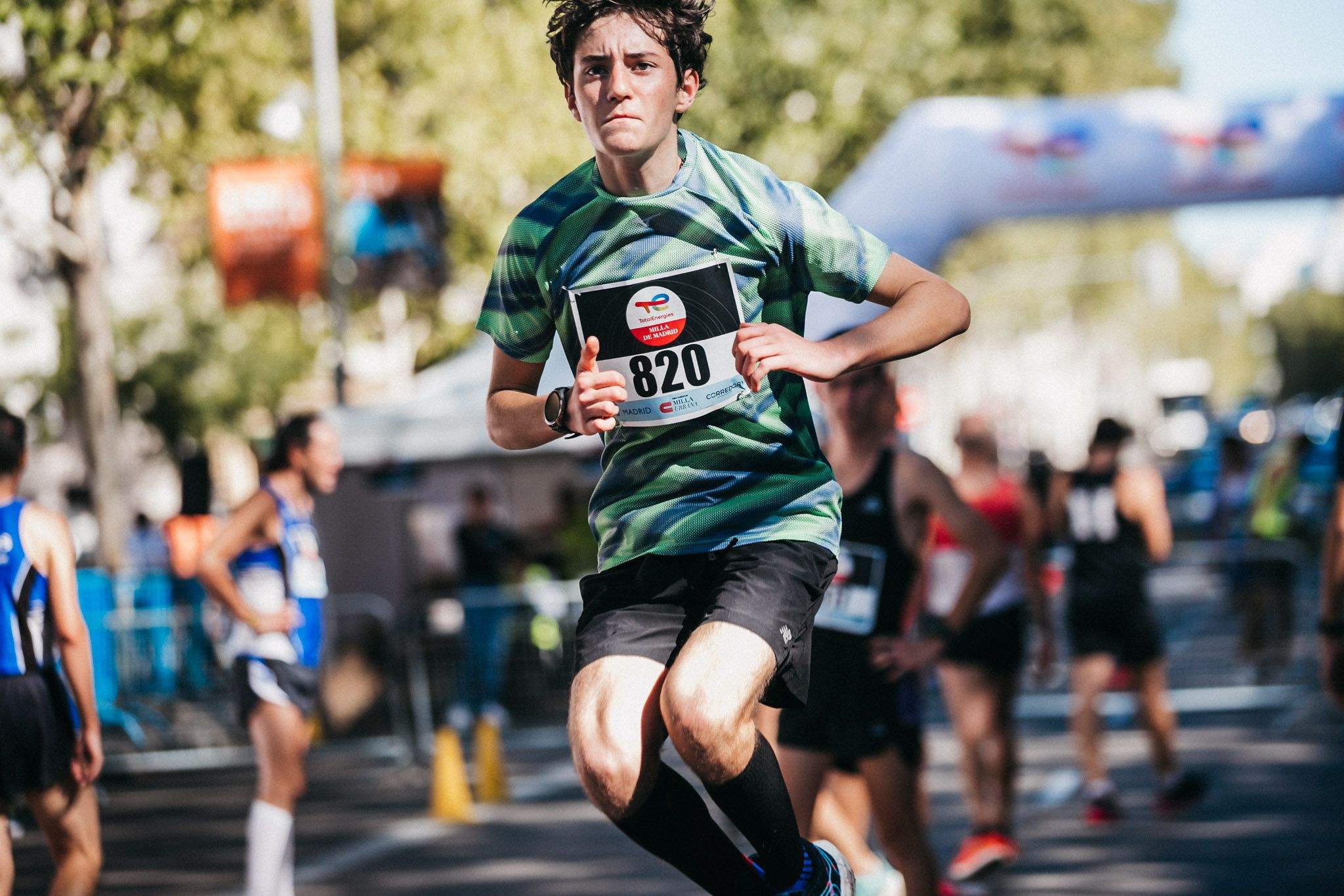Las mejores fotos de las carreras populares en la TotalEnergies Milla de Madrid 2023. (154)