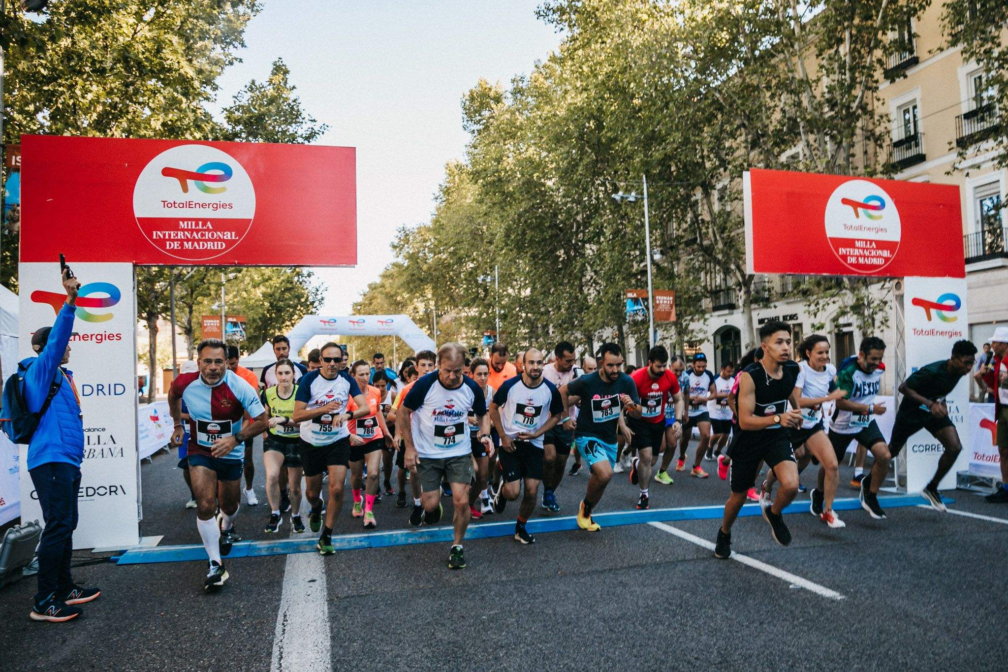 Las mejores fotos de las carreras populares en la TotalEnergies Milla Internacional de Madrid 2023. (210)