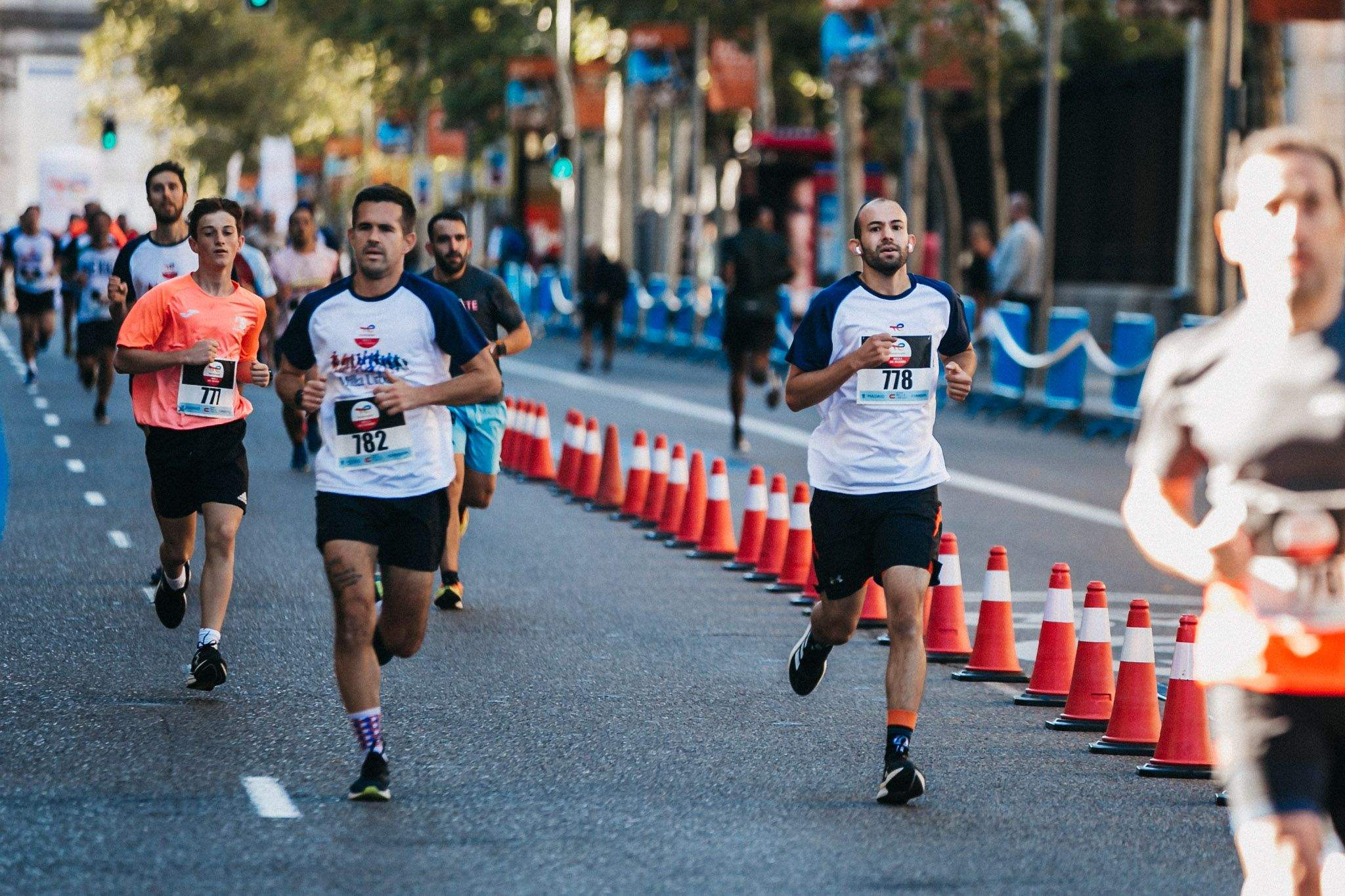 Las mejores fotos de las carreras populares en la TotalEnergies Milla Internacional de Madrid 2023. (233)