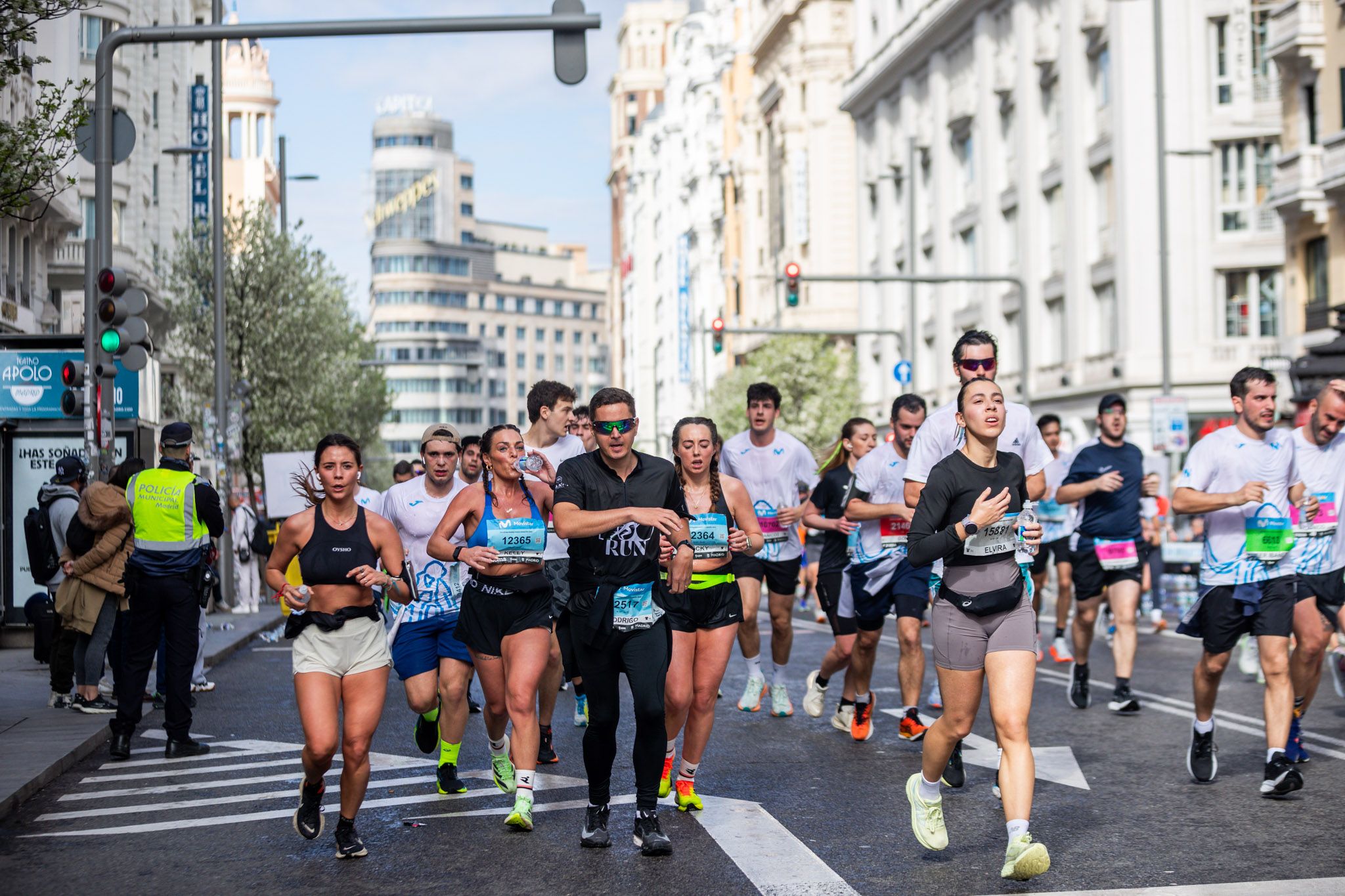 Corredores del Movistar Madrid Medio Maratón a su paso por la Gran Via Corredores del Movistar Madrid Medio Maratón a su paso por la Gran Via