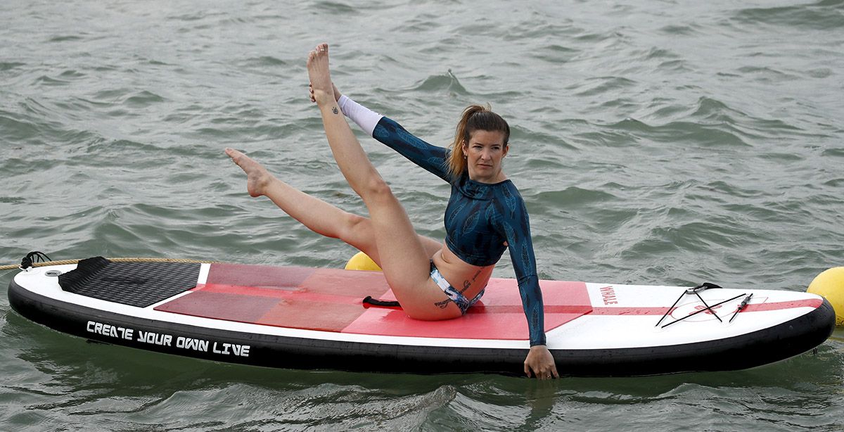 Ejercicios para perder peso y tonificar: el paddle surf, el