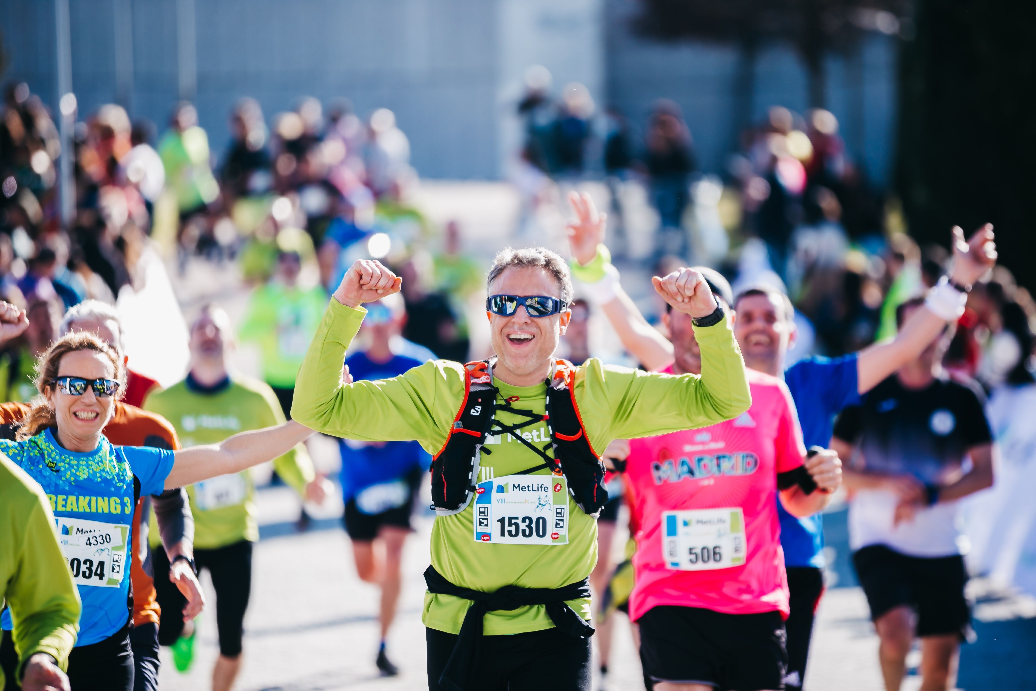 Alegría en la línea de meta de la última edición de la Metlife 15K Madrid Activa