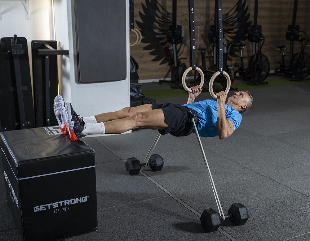 Remo invertido con pies elevados lastrado