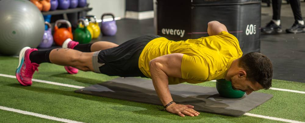 Flexiones asimétricas con abducción de brazo 1