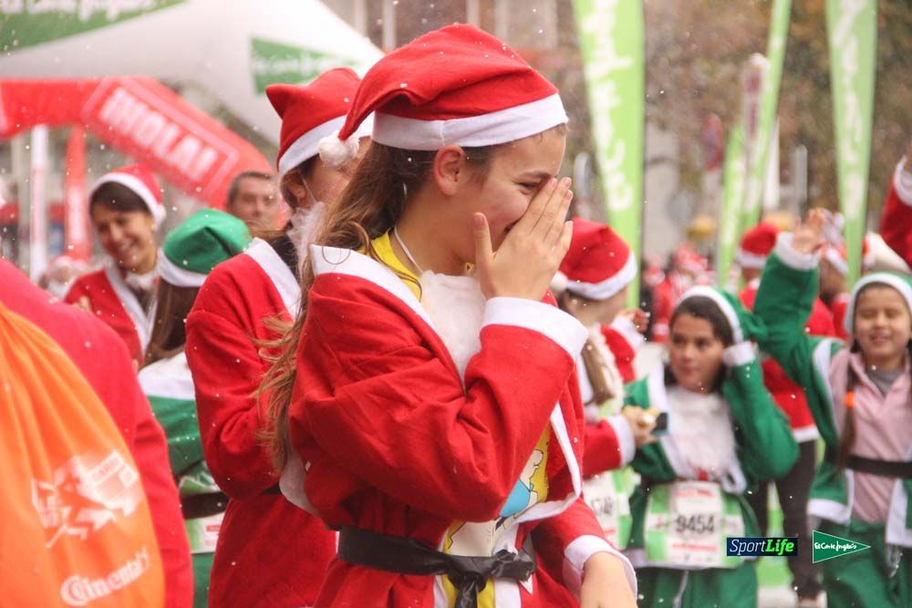 Galería de la Carrera de Papá Noel, entrada en meta a partir minuto 56