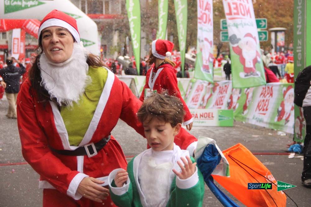 Galería de la Carrera de Papá Noel, entrada en meta a partir minuto 56