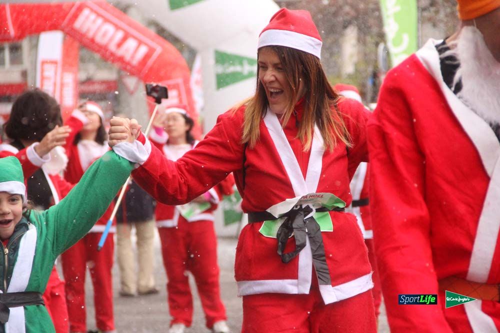 Galería de la Carrera de Papá Noel, entrada en meta a partir minuto 56