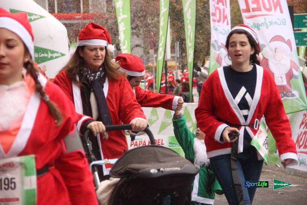 Galería de la Carrera de Papá Noel, entrada en meta a partir minuto 56