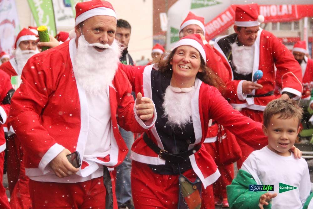 Galería de la Carrera de Papá Noel, entrada en meta a partir minuto 56
