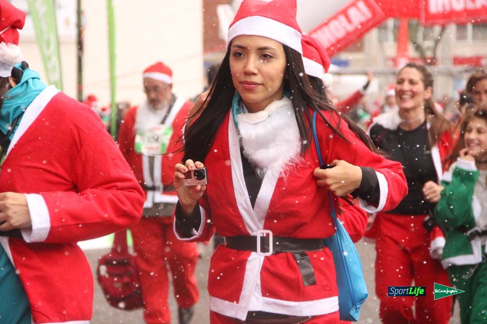 Galería de la Carrera de Papá Noel, entrada en meta a partir minuto 56