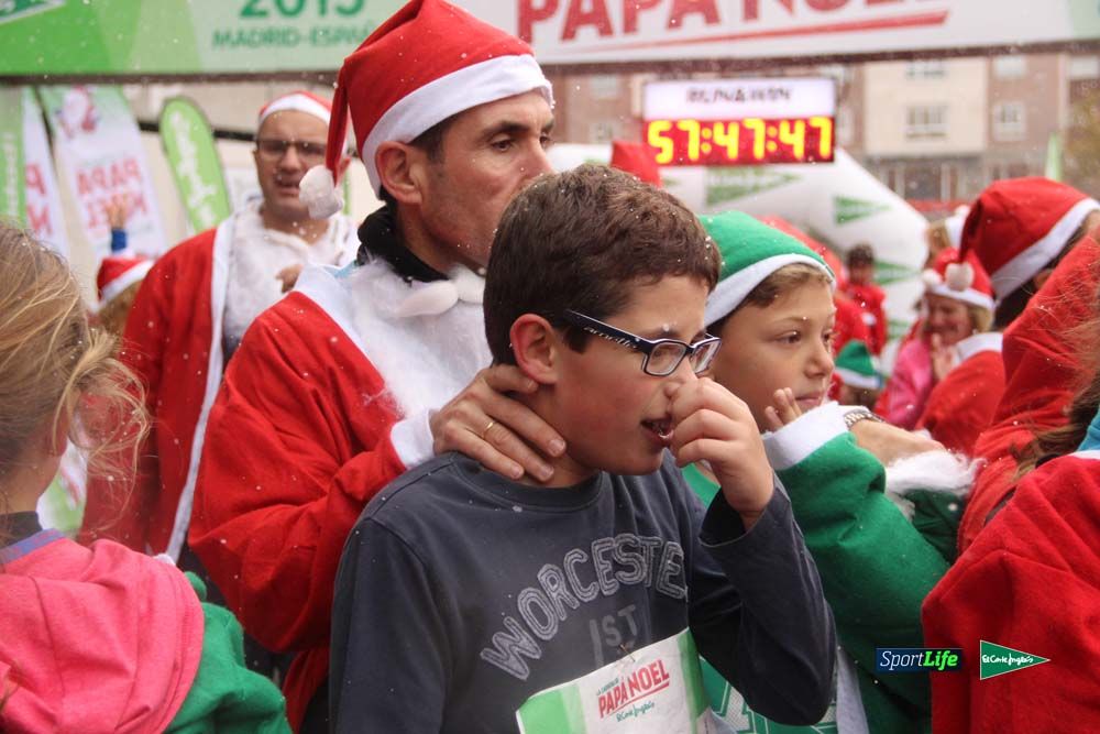 Galería de la Carrera de Papá Noel, entrada en meta a partir minuto 56