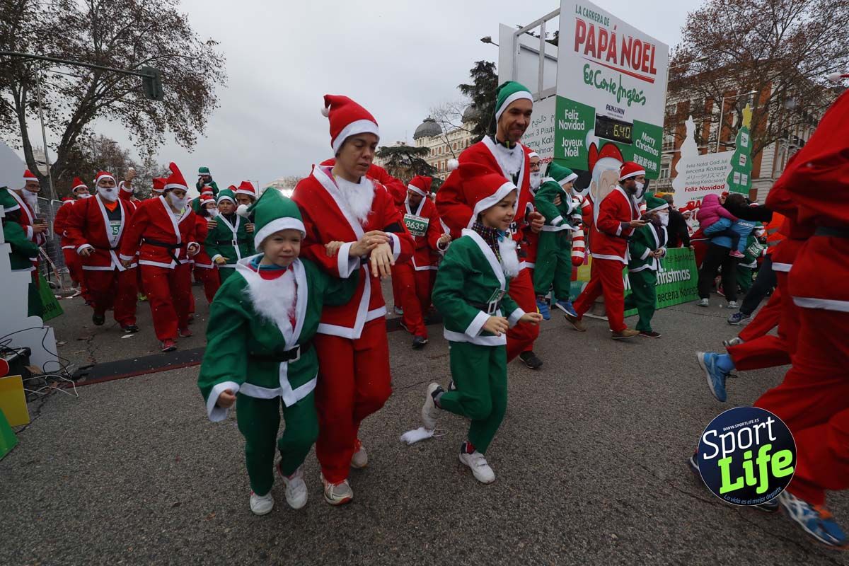 El ambiente de la Carrera de Papá Noel en Madrid