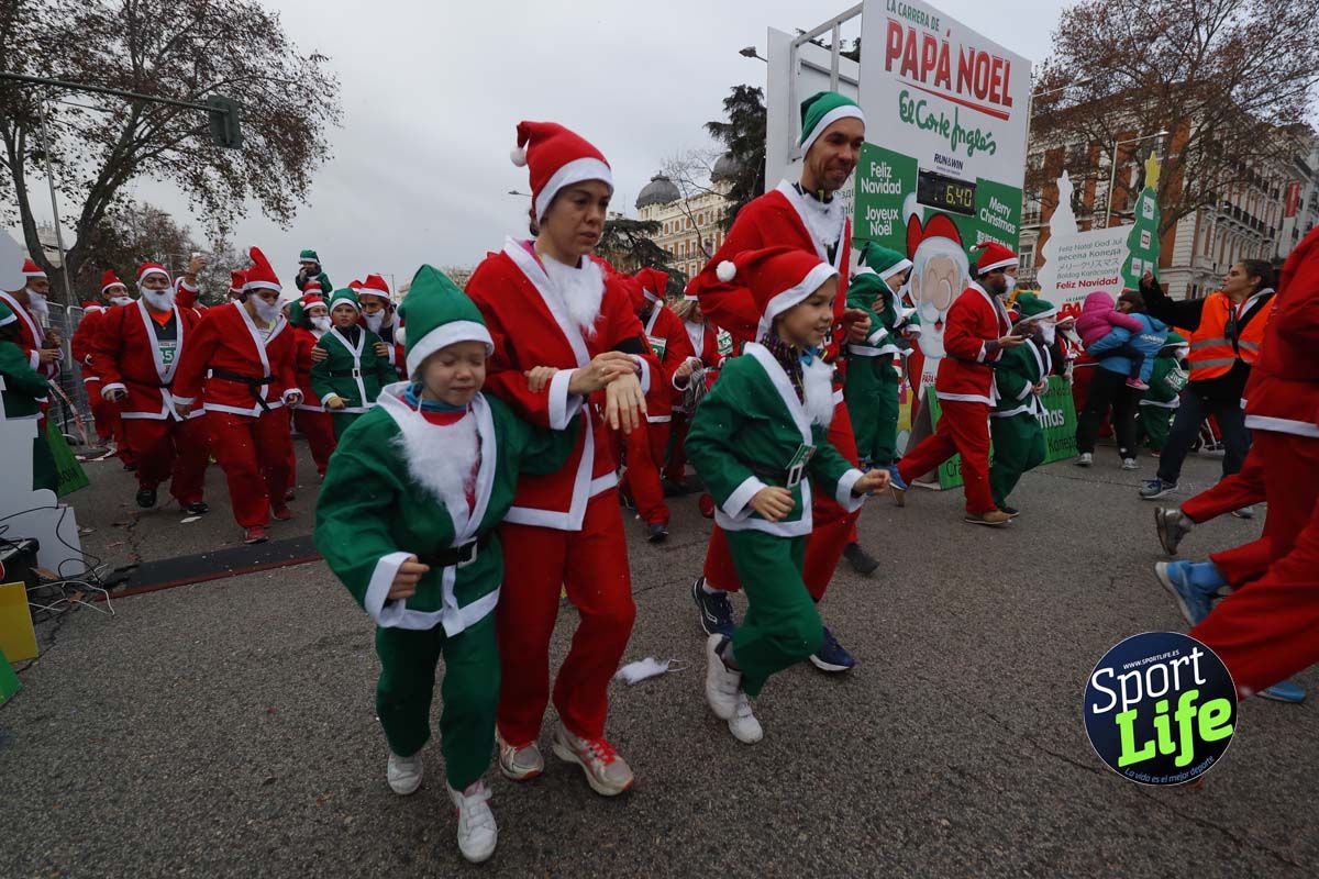 El ambiente de la Carrera de Papá Noel en Madrid