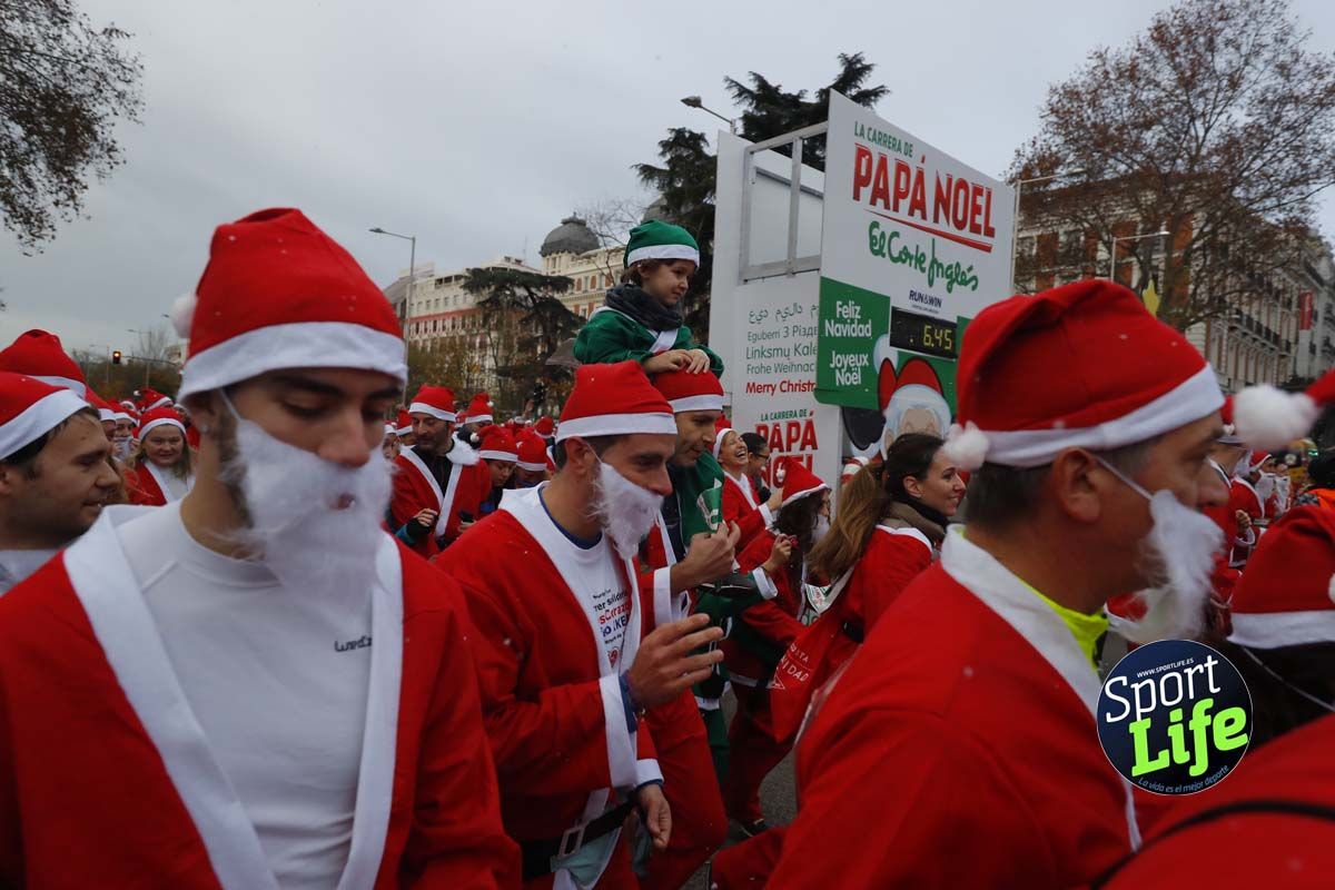 El ambiente de la Carrera de Papá Noel en Madrid