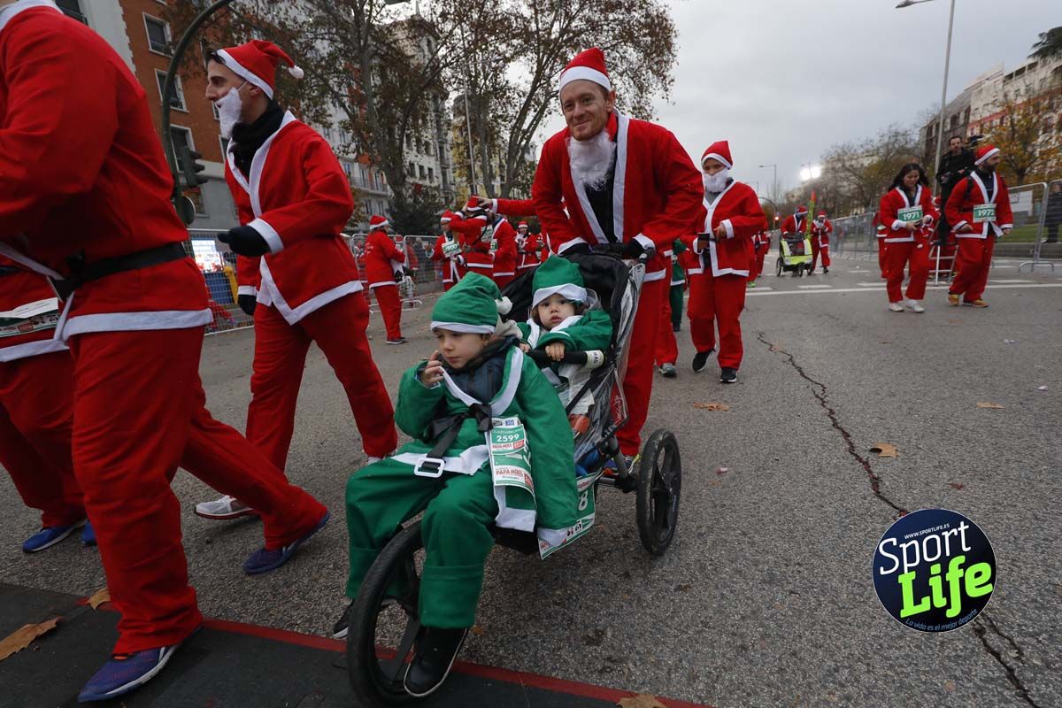 El ambiente de la Carrera de Papá Noel en Madrid