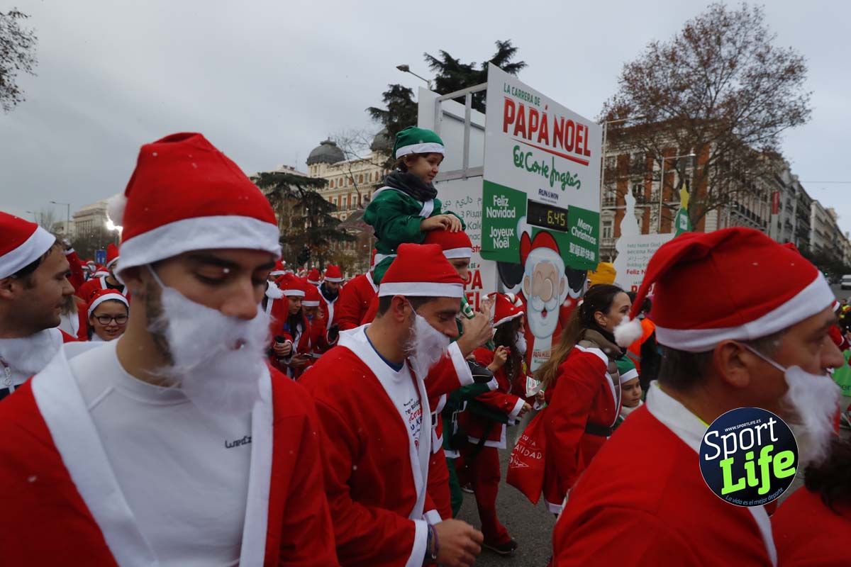 El ambiente de la Carrera de Papá Noel en Madrid
