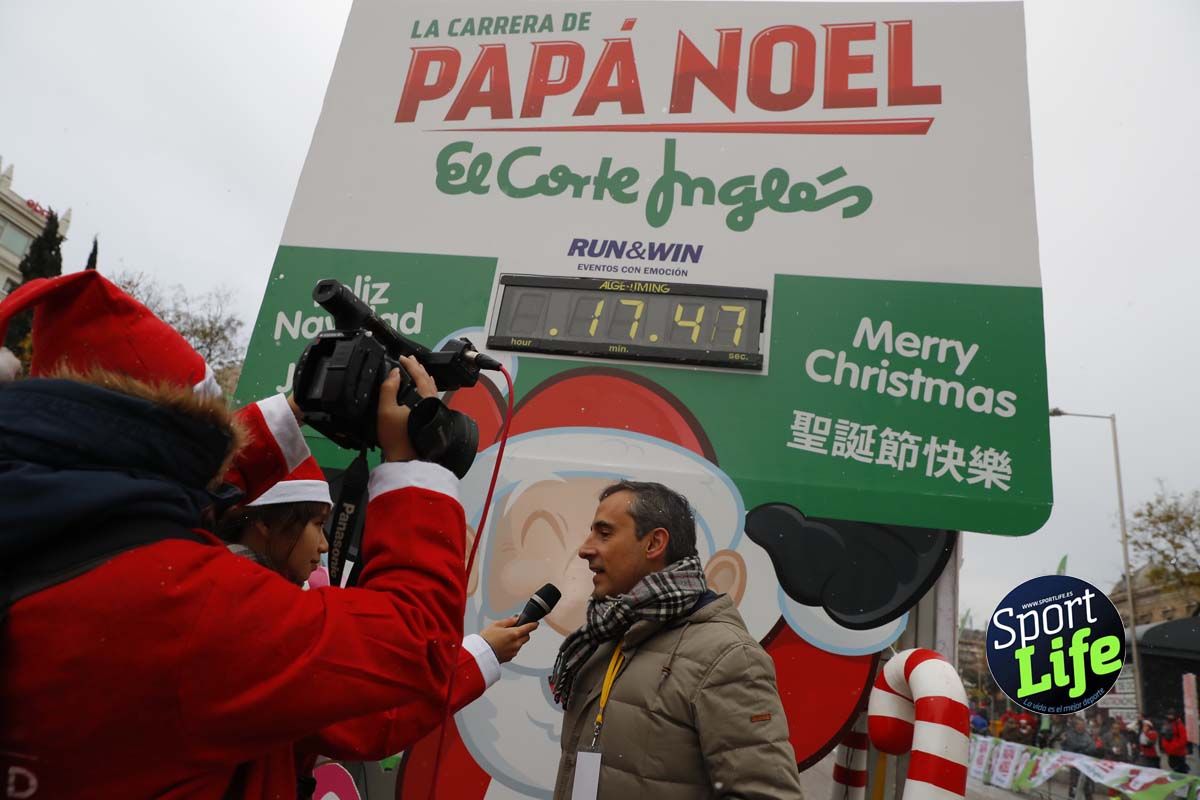 El ambiente de la Carrera de Papá Noel en Madrid