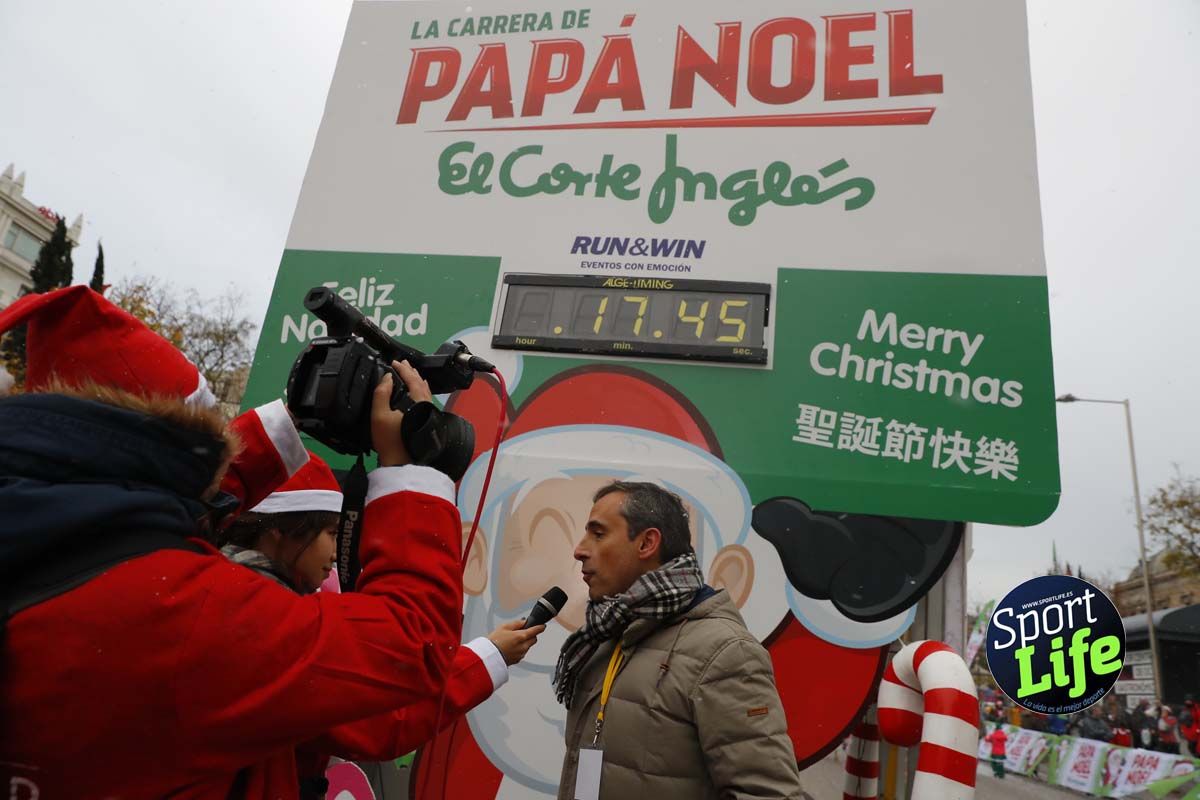 El ambiente de la Carrera de Papá Noel en Madrid