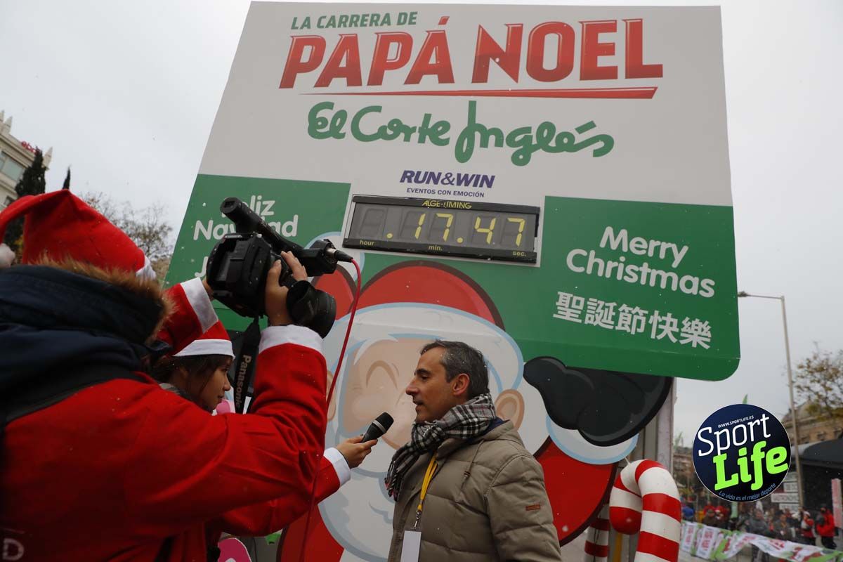 El ambiente de la Carrera de Papá Noel en Madrid