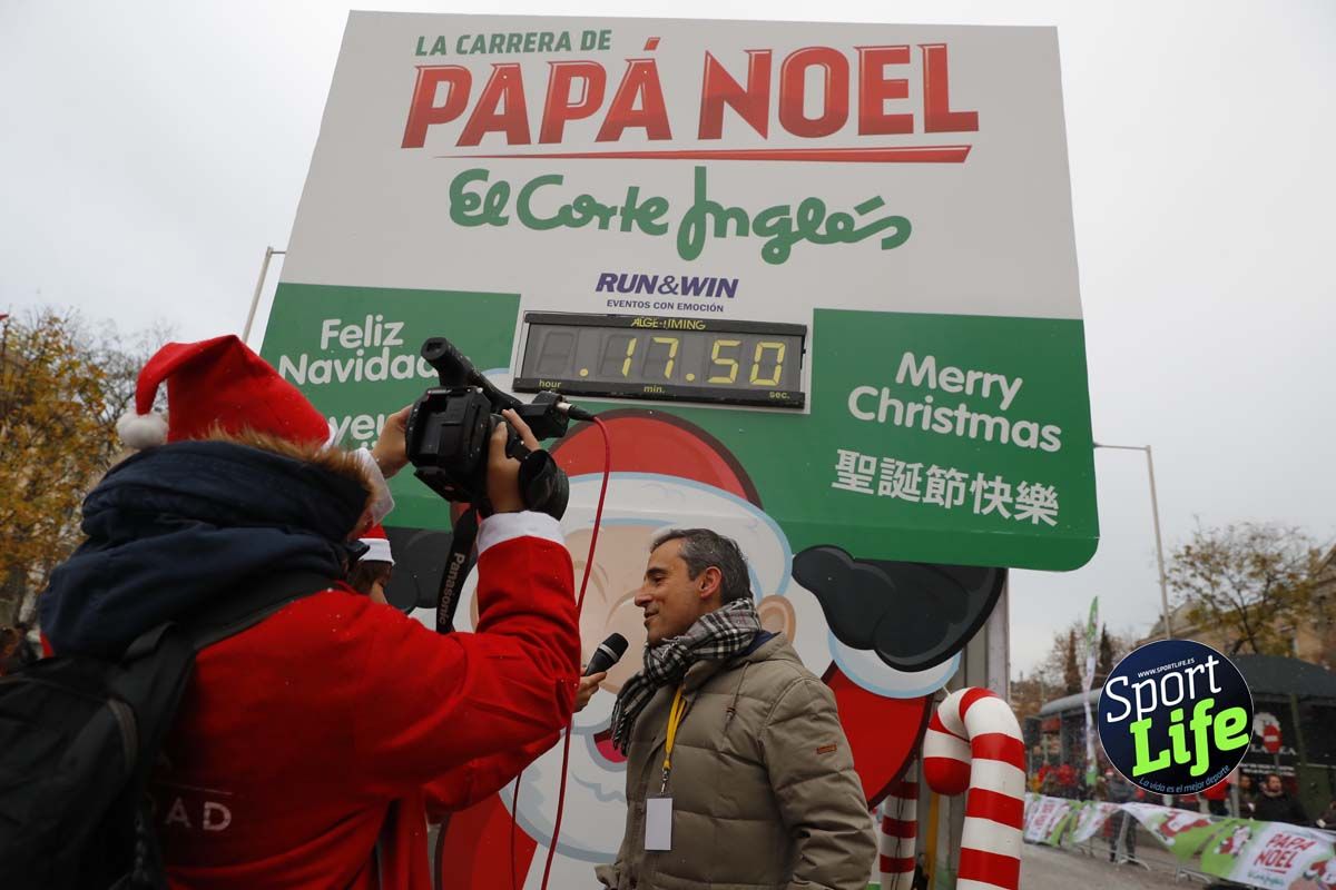 El ambiente de la Carrera de Papá Noel en Madrid
