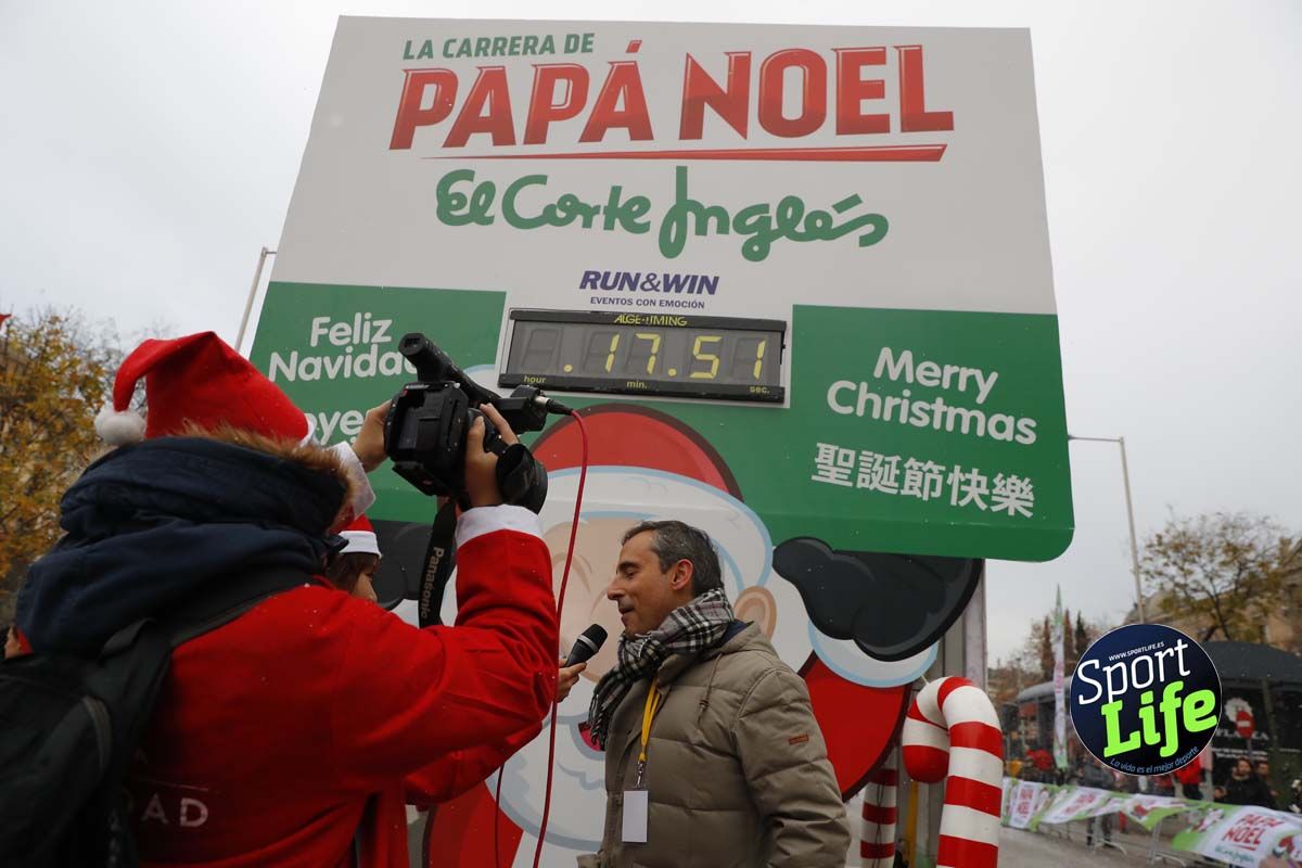 El ambiente de la Carrera de Papá Noel en Madrid