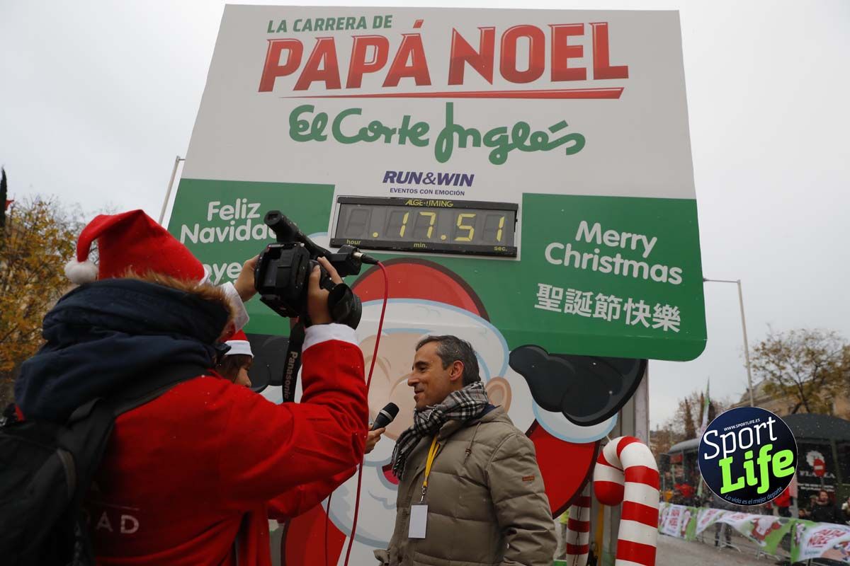 El ambiente de la Carrera de Papá Noel en Madrid
