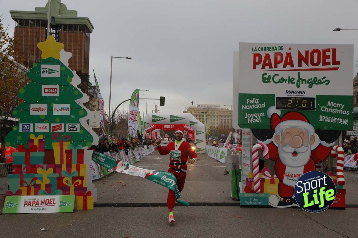 El ambiente de la Carrera de Papá Noel en Madrid