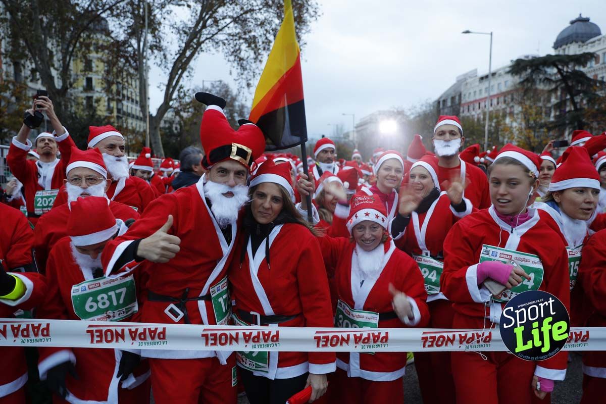 El ambiente de la Carrera de Papá Noel en Madrid