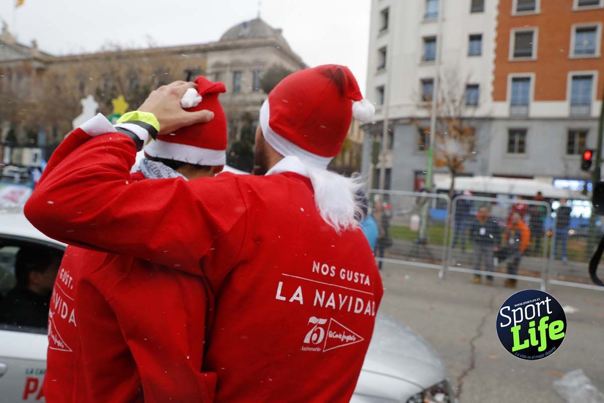 El ambiente de la Carrera de Papá Noel en Madrid