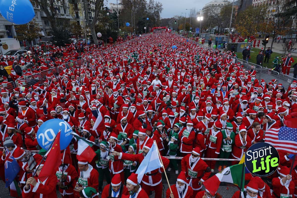 El ambiente de la Carrera de Papá Noel en Madrid
