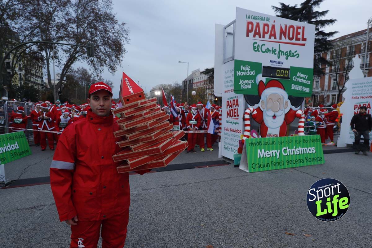 El ambiente de la Carrera de Papá Noel en Madrid