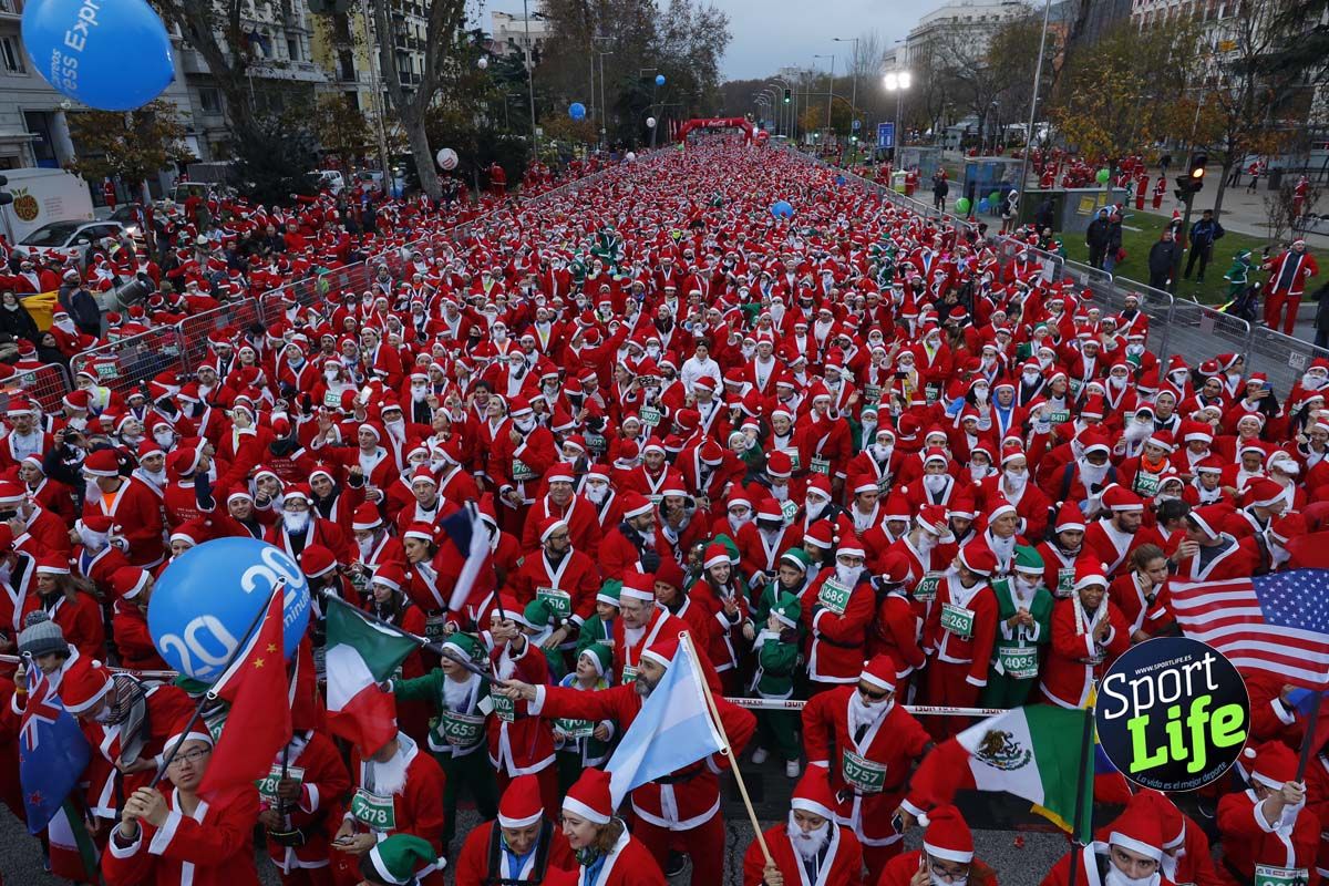 El ambiente de la Carrera de Papá Noel en Madrid
