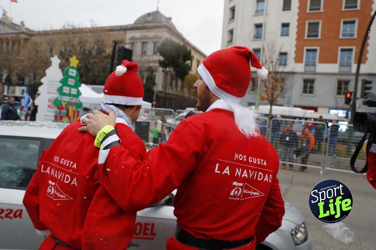 El ambiente de la Carrera de Papá Noel en Madrid