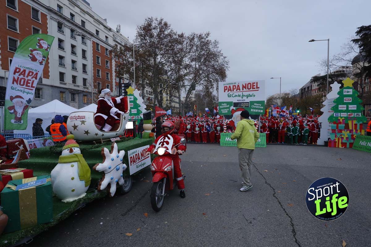 El ambiente de la Carrera de Papá Noel en Madrid
