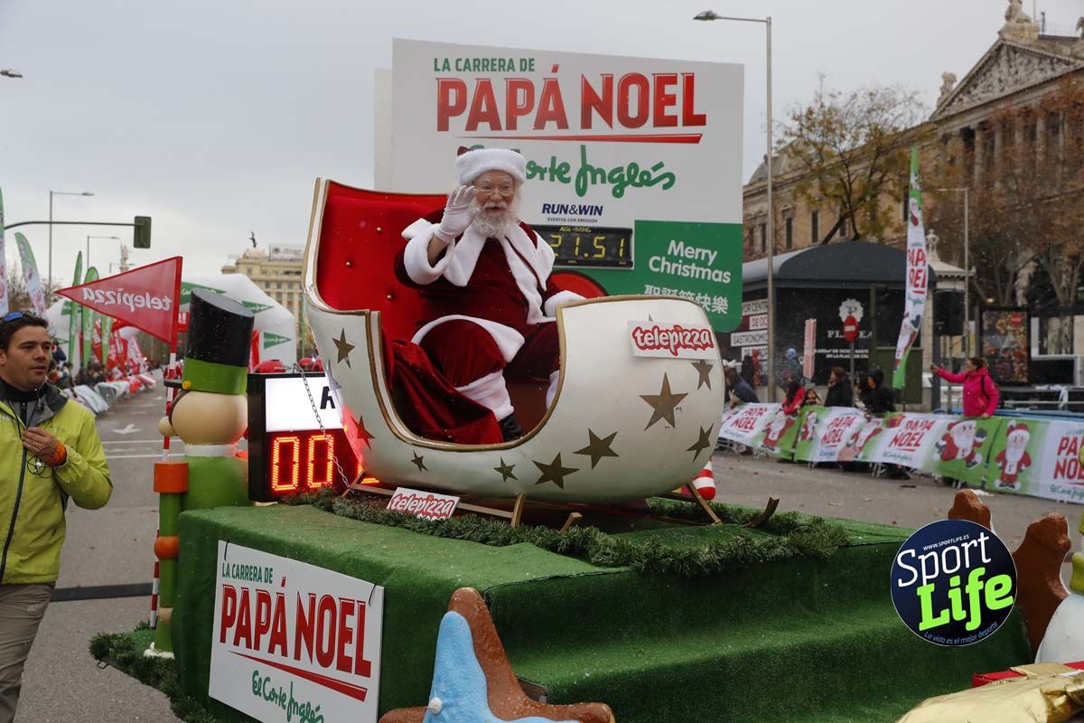 El ambiente de la Carrera de Papá Noel en Madrid