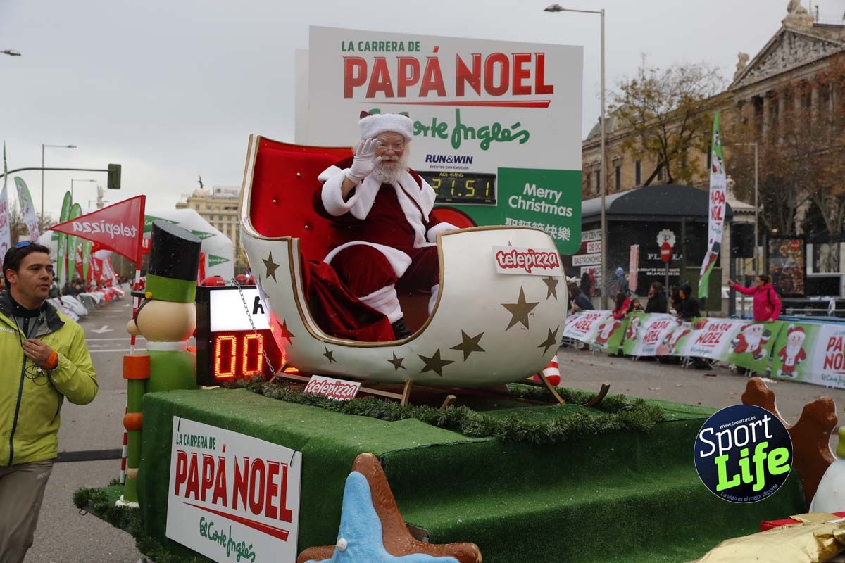 El ambiente de la Carrera de Papá Noel en Madrid