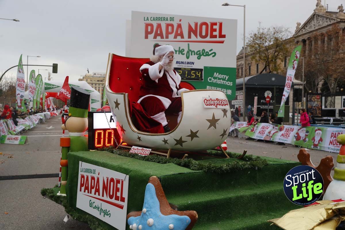 El ambiente de la Carrera de Papá Noel en Madrid