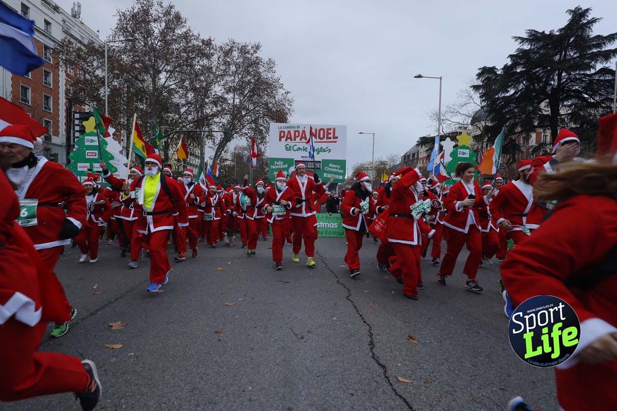 El ambiente de la Carrera de Papá Noel en Madrid
