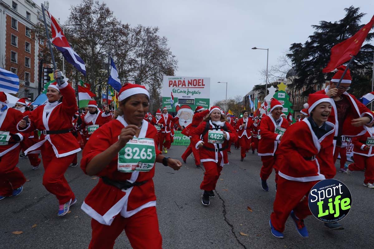 El ambiente de la Carrera de Papá Noel en Madrid