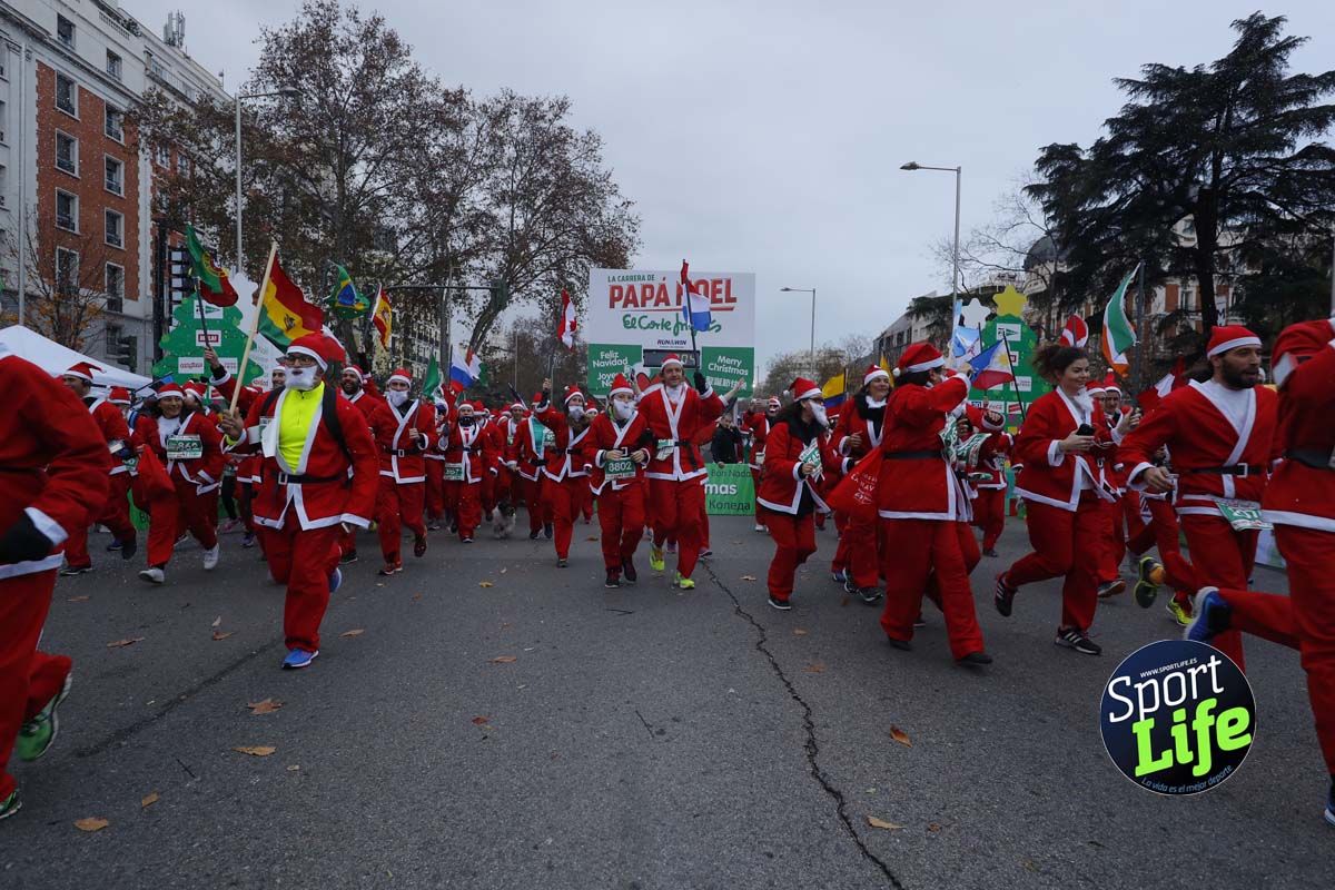 El ambiente de la Carrera de Papá Noel en Madrid
