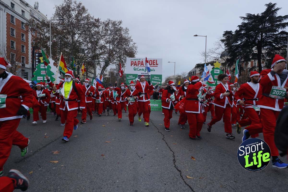 El ambiente de la Carrera de Papá Noel en Madrid