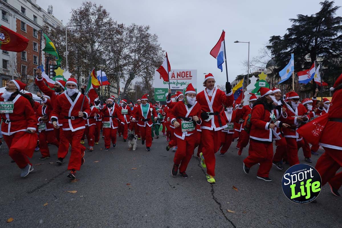 El ambiente de la Carrera de Papá Noel en Madrid