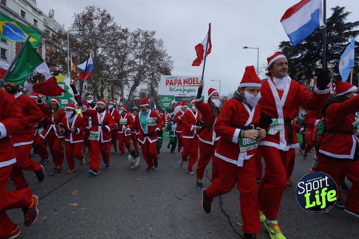 El ambiente de la Carrera de Papá Noel en Madrid