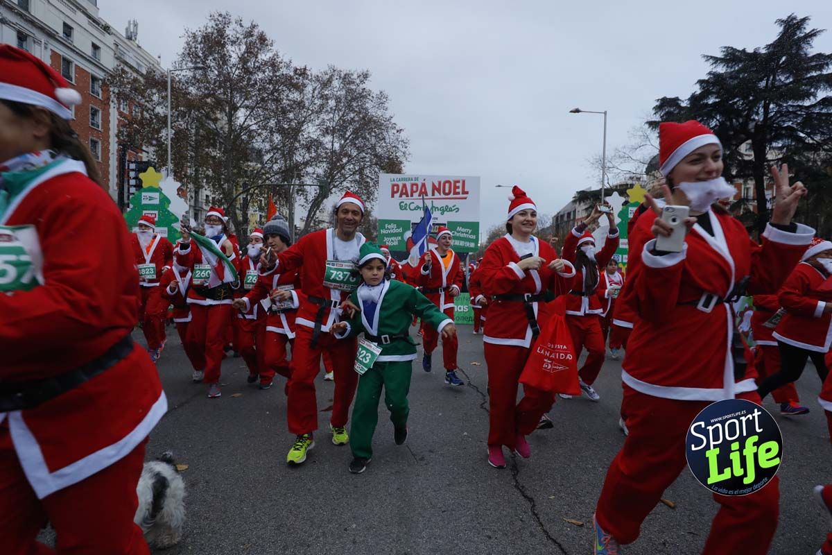 El ambiente de la Carrera de Papá Noel en Madrid