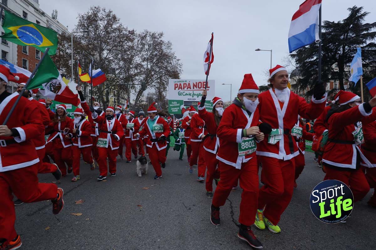 El ambiente de la Carrera de Papá Noel en Madrid