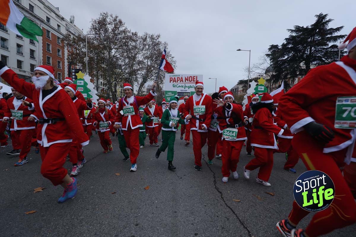 El ambiente de la Carrera de Papá Noel en Madrid